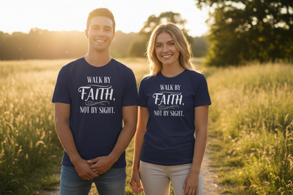 Couple in natural setting wearing navy Walk by Faith T-shirts