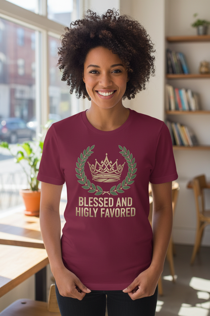 Woman smiling wearing Blessed and Highly Favored t-shirt in maroon - front view